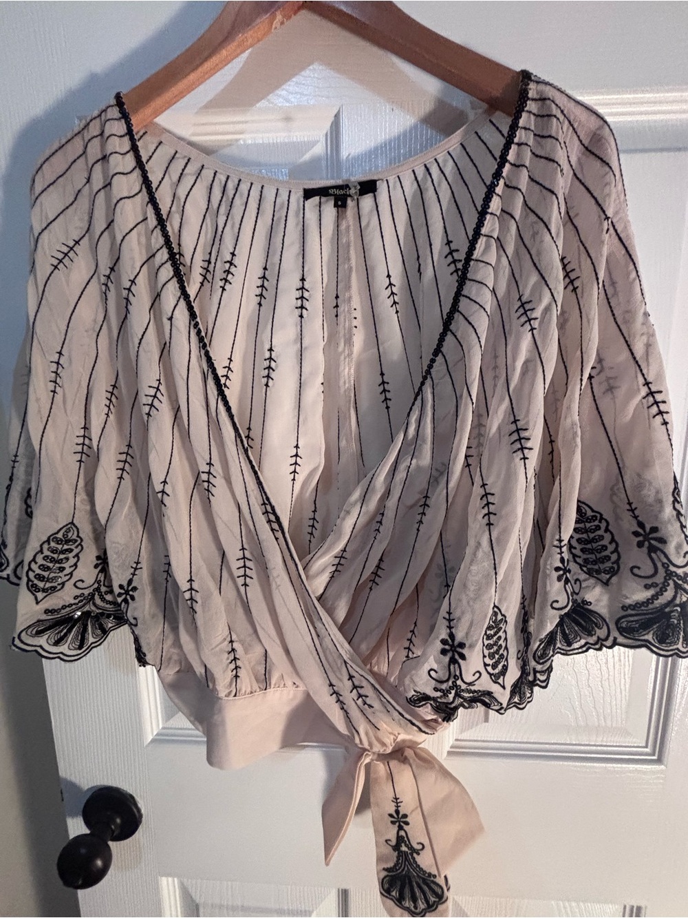 Cream colored Embroidered Wrap Top with Black Detailing